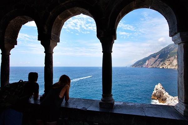 Couple Looking out to Sea from a Window at the Church of St Peter