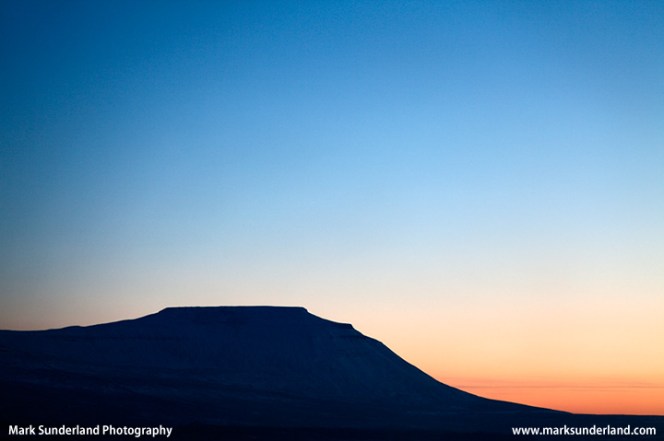 The Flat Topped Peak of Ingleborough at Sunset in Winter