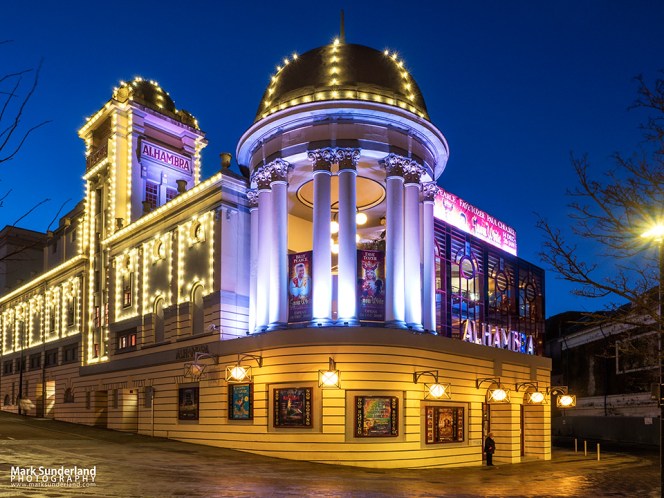 Lights on the Alhambra Theatre at dusk, Bradford