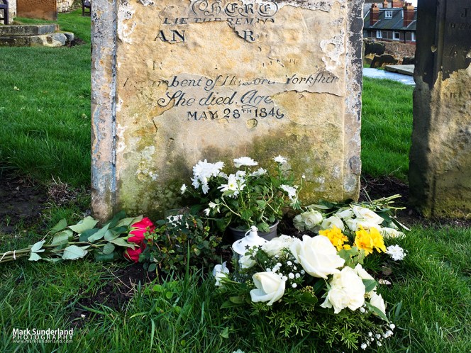 Anne Bronte grave with flowers laid for her bicentenary in January 2020