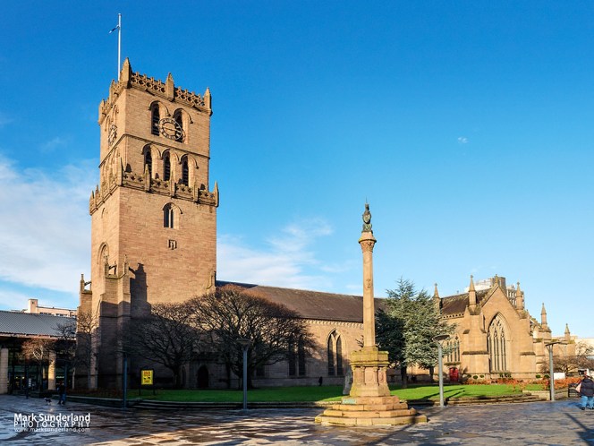 The Steeple Church part of the City Churches building and the Mercat Cross on Nethergate, Dundee, Scotland