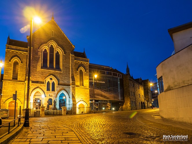 Aberdeen Maritime Museum floodlit at dusk